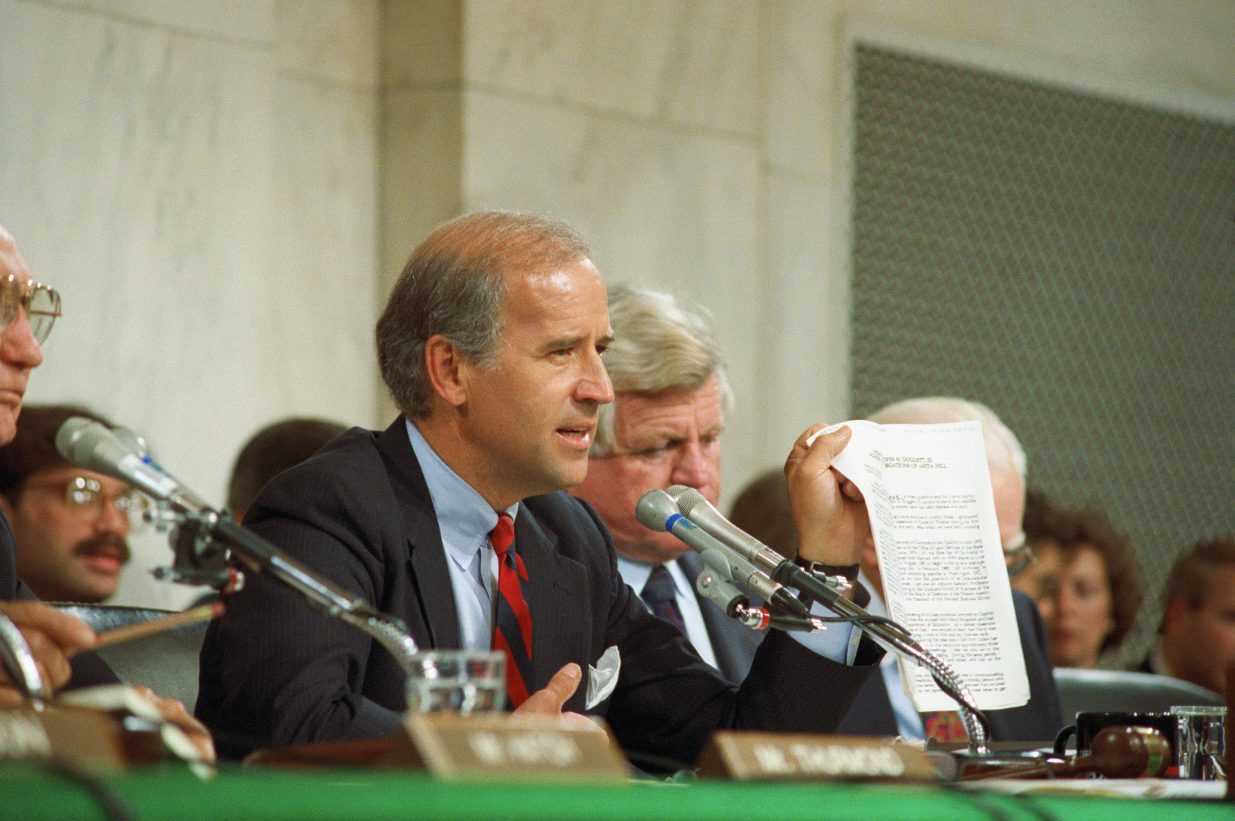 After Anita Hill accuses Clarence Thomas of sexual harassment, Biden presides over an all-white-male panel in the Senate in 1991 (Getty Images)