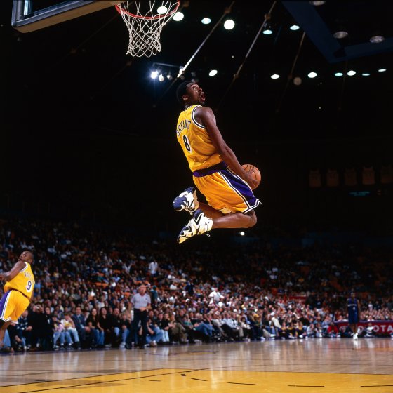 Bryantâ€™s aerial displays were among the gameâ€™s most thrilling ever; here, a reverse slam in a 1998 home game