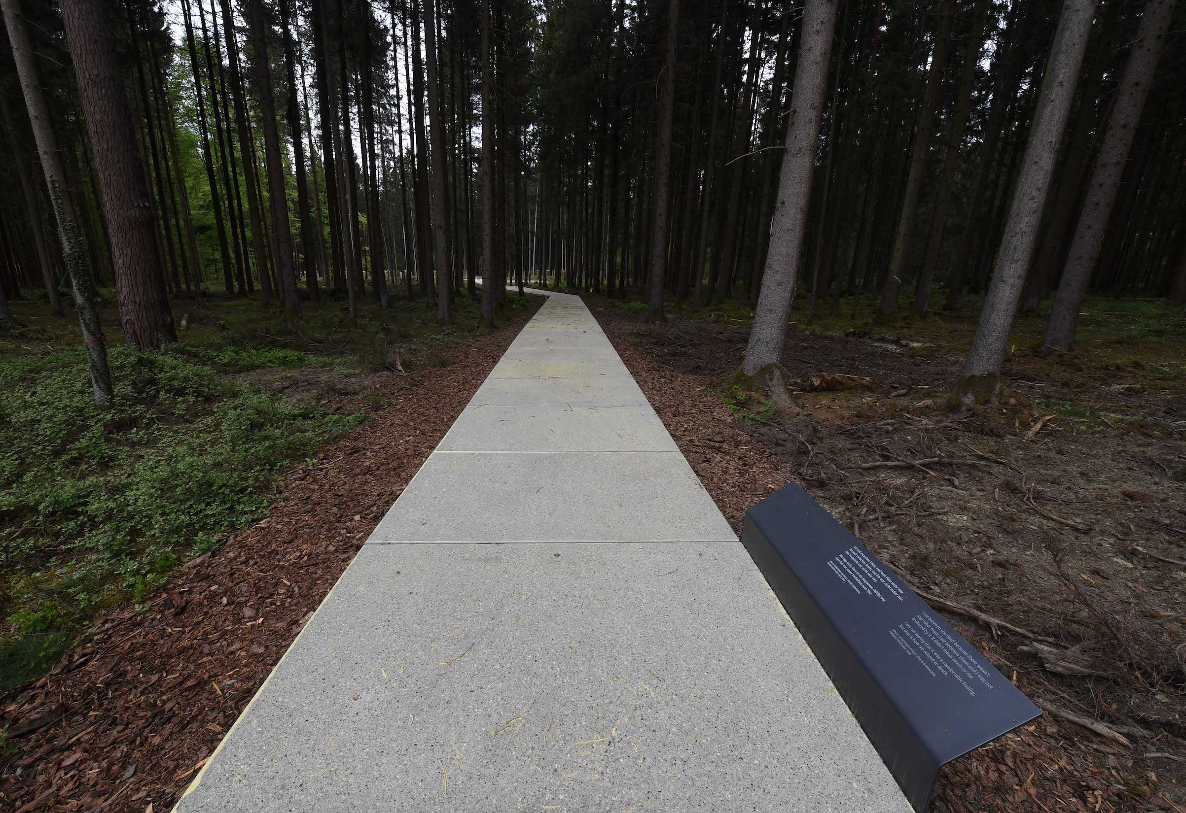 Concrete slabs lead to the places of the former mass grave of the former concentration camp Muehldorf at the Muehldorfer Hart, southern Germany, pictured on April 26, 2018. (AFP via Getty Images)