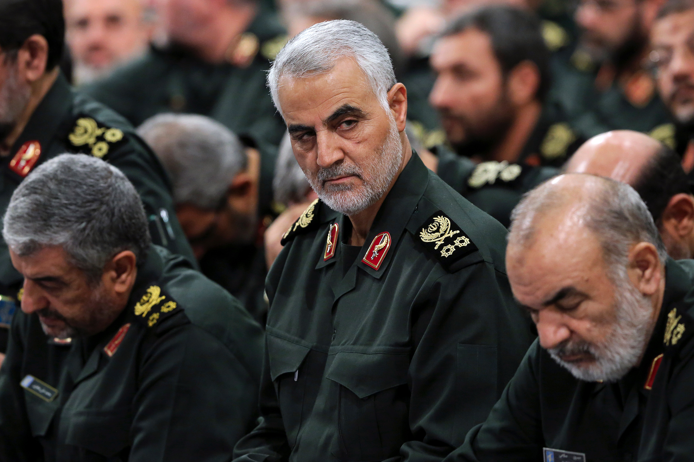 Gen. Qasem Soleimani, center, attends a meeting with Supreme Leader Ayatollah Ali Khamenei and Revolutionary Guard commanders in Tehran in September 2016. (Office of the Iranian Supreme Leader/AP)