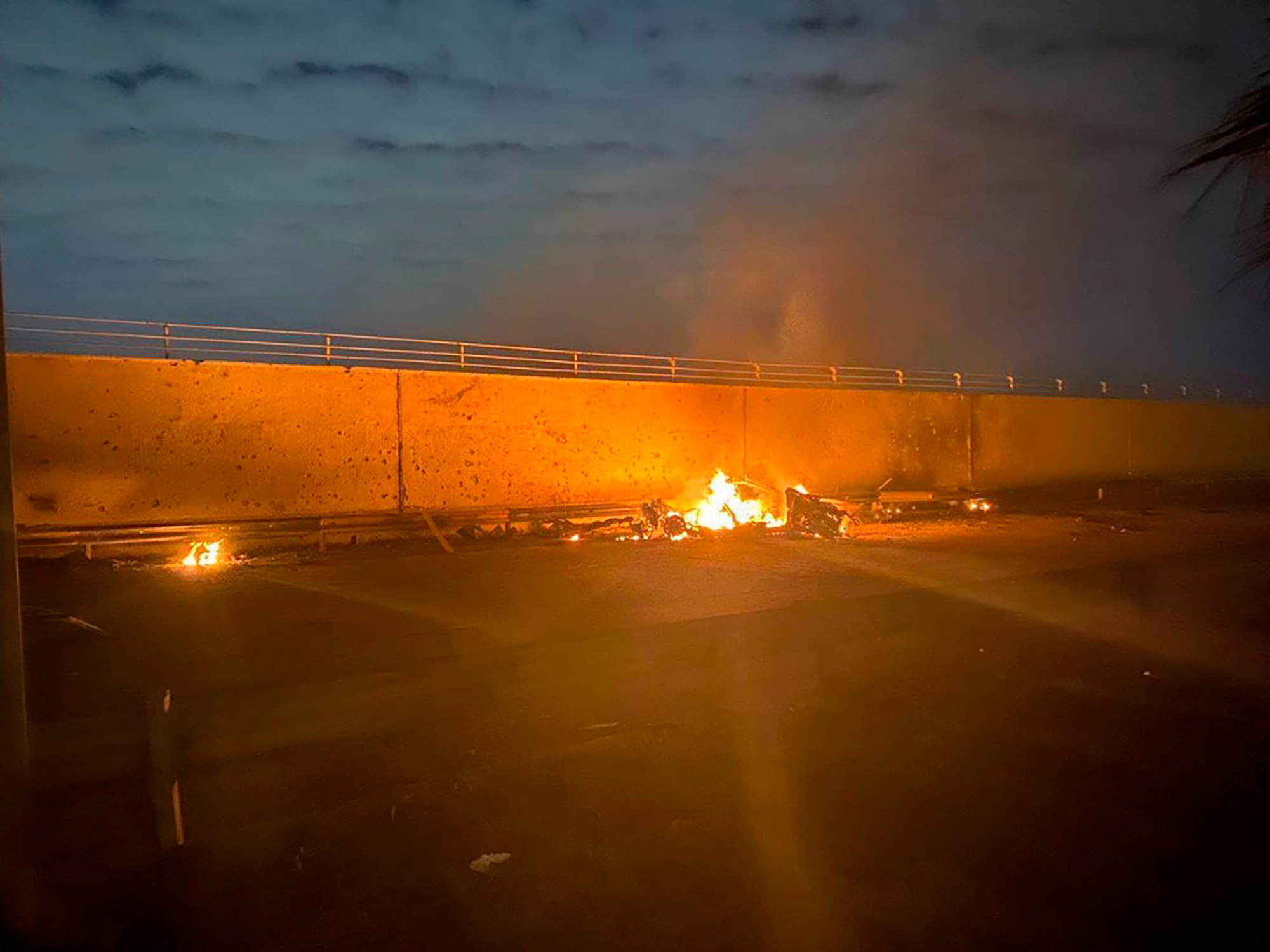 A burning vehicle following an airstrike at Baghdad International Airport on Jan. 3, 2020. The Pentagon said the U.S. military killed Gen. Qasem Soleimani, the head of Iran's elite Quds Force, at the direction of President Trump.