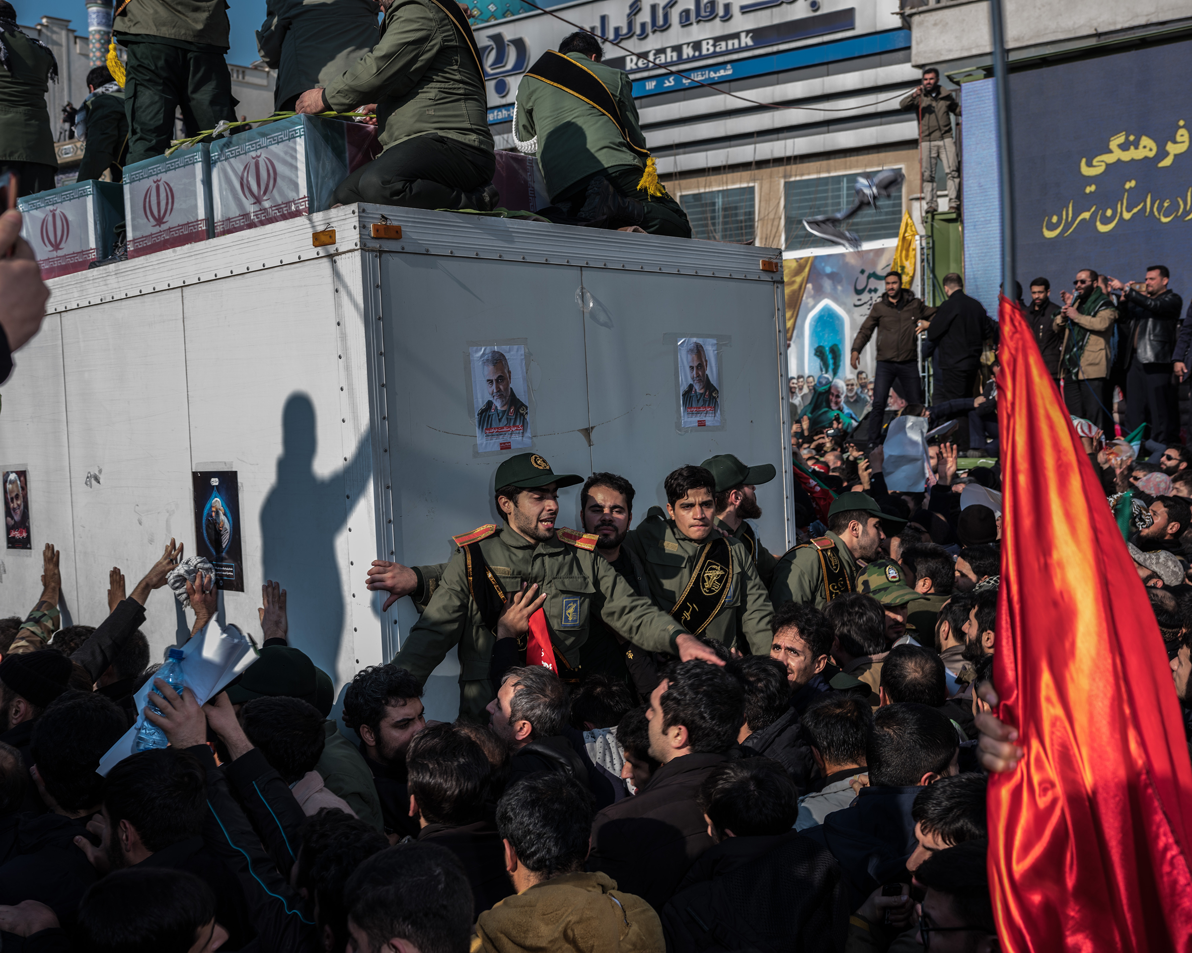 Soleimani’s coffin is surrounded by throngs in Tehran’s Enghelab Square on Jan. 6. (Newsha Tavakolian—Magnum Photos for TIME)