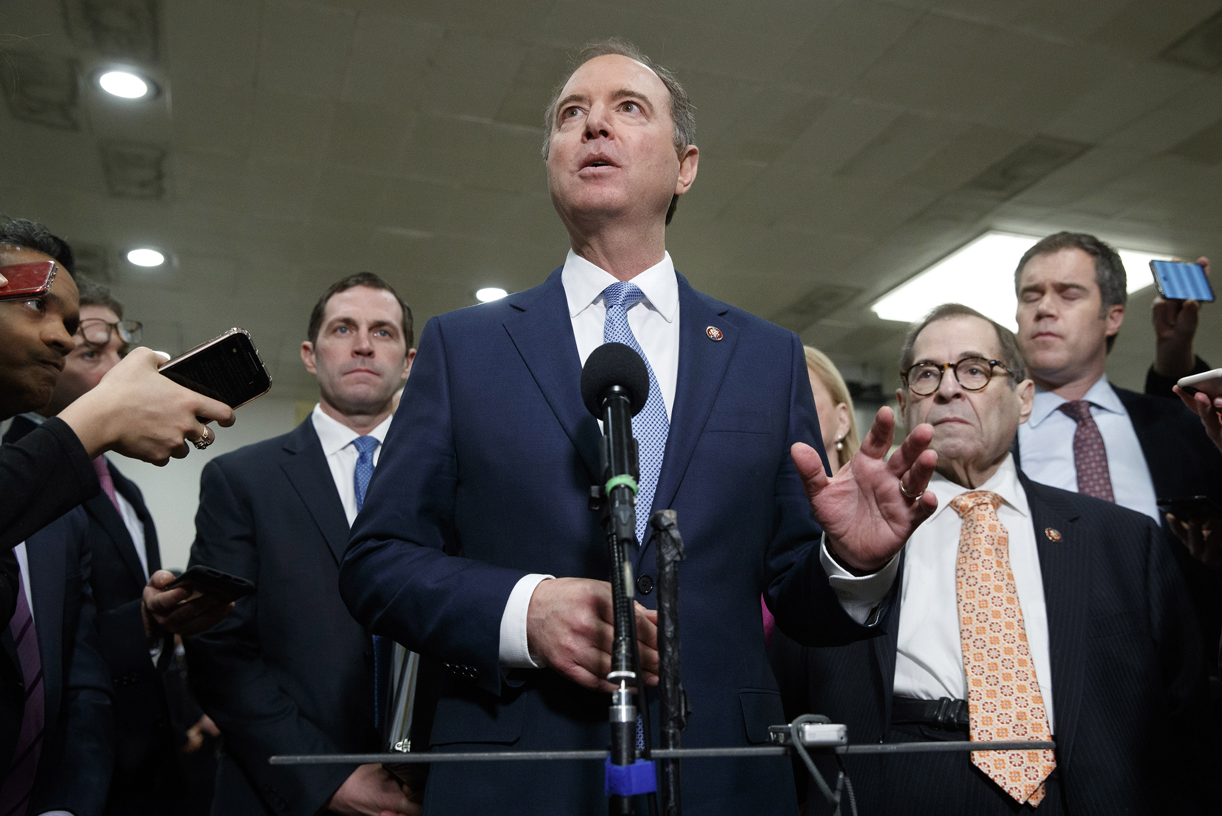 House Democratic impeachment managers including House Intelligence Committee Chairman Adam Schiff, D-Calif., center, with Rep. Jason Crow, D-Colo., left, and Judiciary Committee Chairman Jerrold Nadler, D-N.Y., speak to the media before attending the fourth day of the impeachment trial of President Donald Trump on Jan. 24, 2020 in Washington. (Jacquelyn Martin—AP)