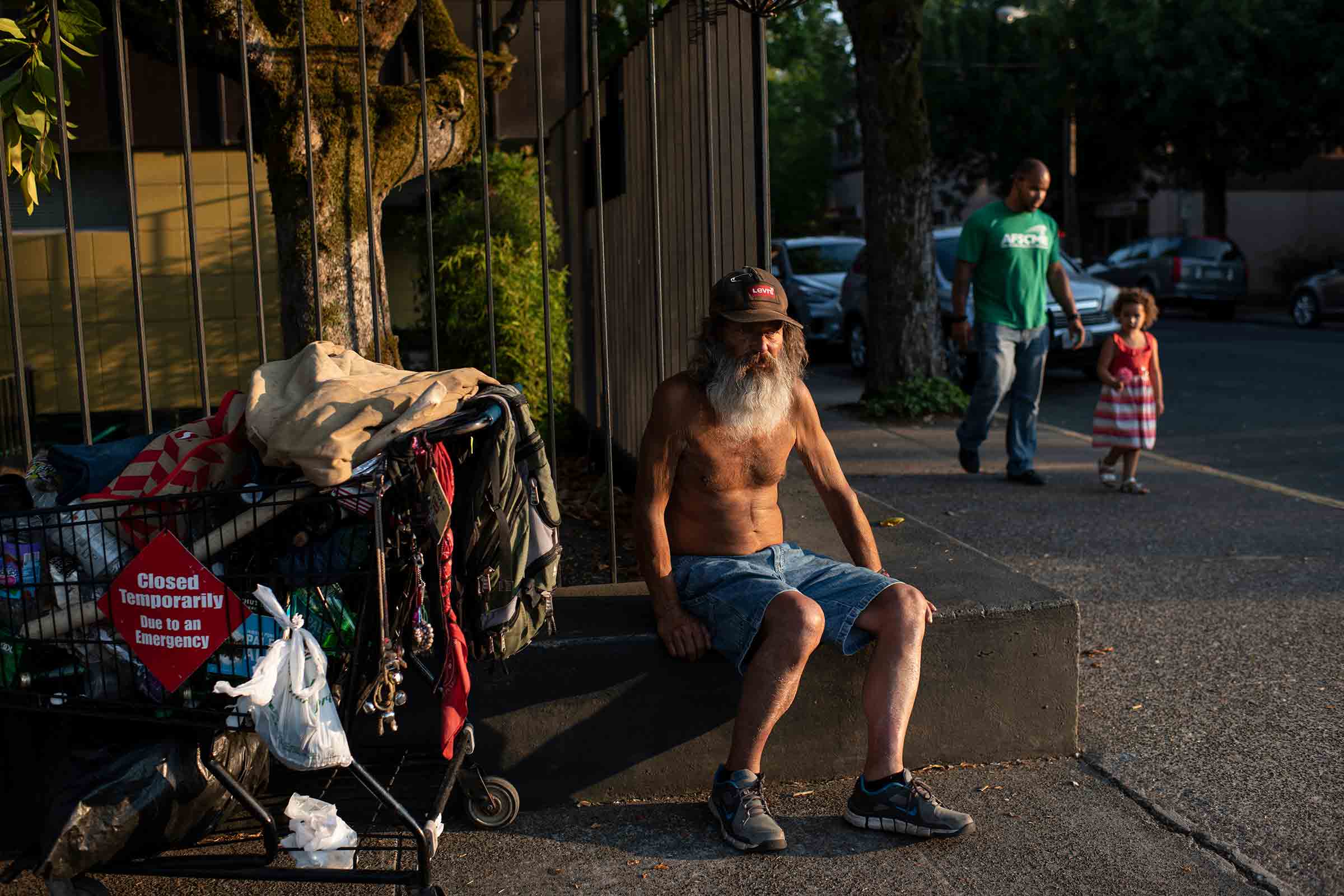 Stepp prepares to bed down in his regular spot in downtown McMinnville, Ore., on Aug. 7, 2018 (Lynsey Addario)
