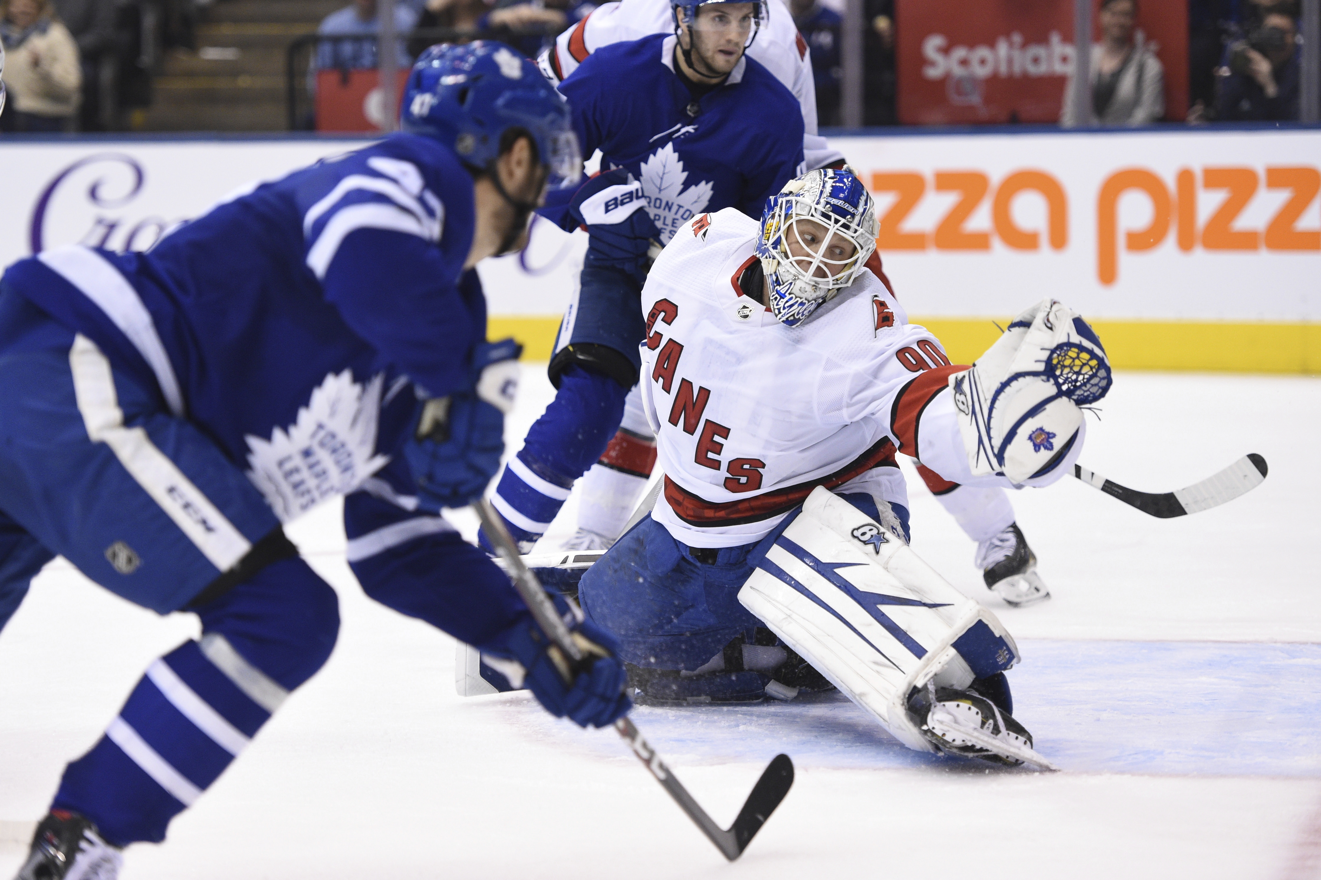 Toronto Maple Leafs left wing Pierre Engvall (47) scores his team's third goal of the game against Carolina Hurricanes emergency goalie David Ayres (90) during second-period NHL hockey game action in Toronto, on Feb. 22, 2020. (Frank Gunn—The Canadian Press via AP))