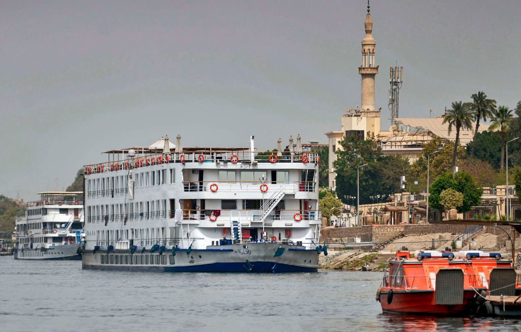 The "A Sara" Nile cruise ship moored off the river bank of Egypt's southern city of Luxor, where 45 people tested positive for the coronavirus. (Photo by AFP via Getty Images)