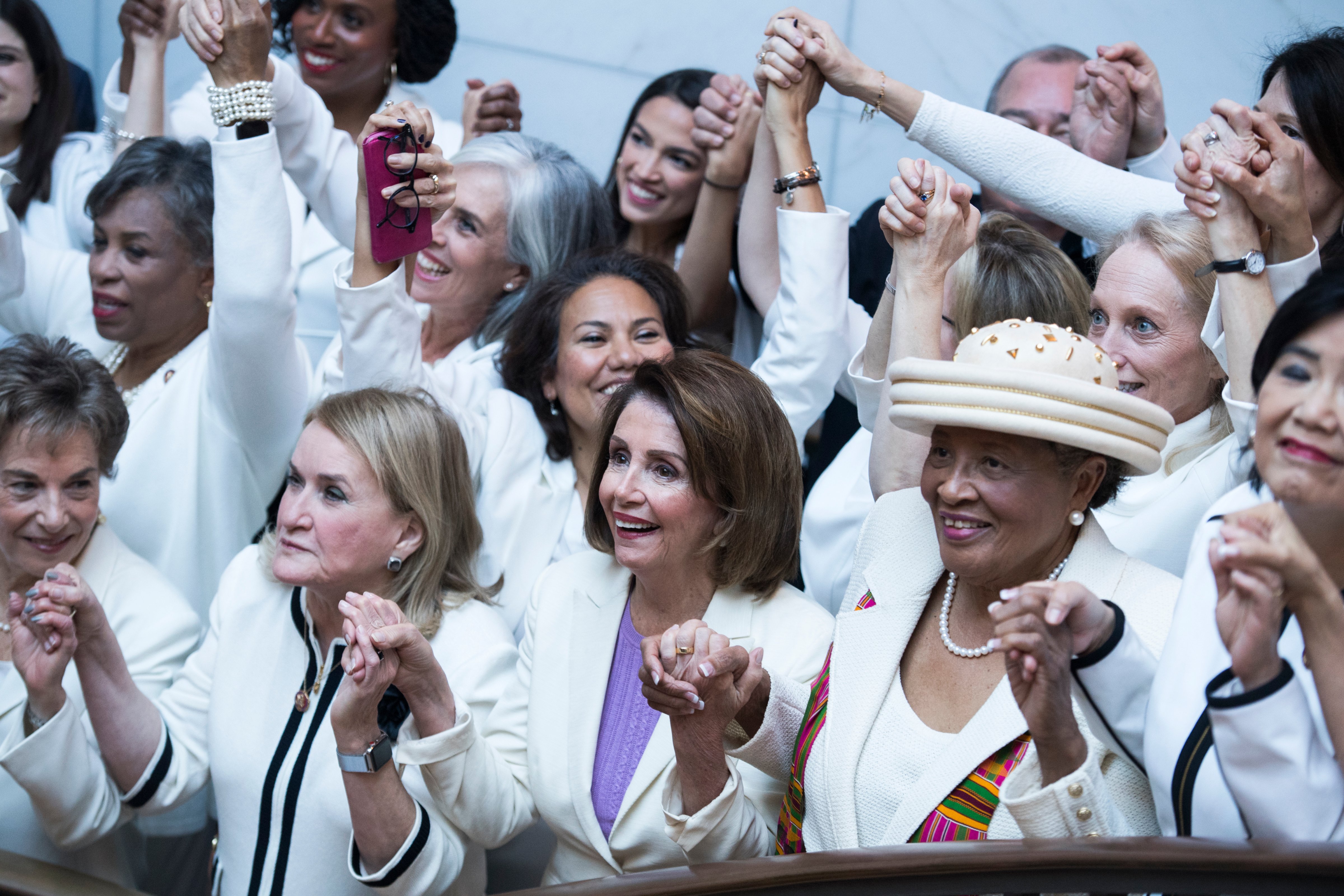 Reps. Jan Schakowsky, D-Ill., Sylvia Garcia, D-Texas, Speaker Nancy Pelosi, D-Calif., and Alma Adams, D-N.C., wore "suffragette white" to the State of the Union address to show solidarity for women's agendas on Tuesday, Feb 5, 2019 in Washington, D.C. (Tom Williams—CQ Roll Call/Getty Images:)