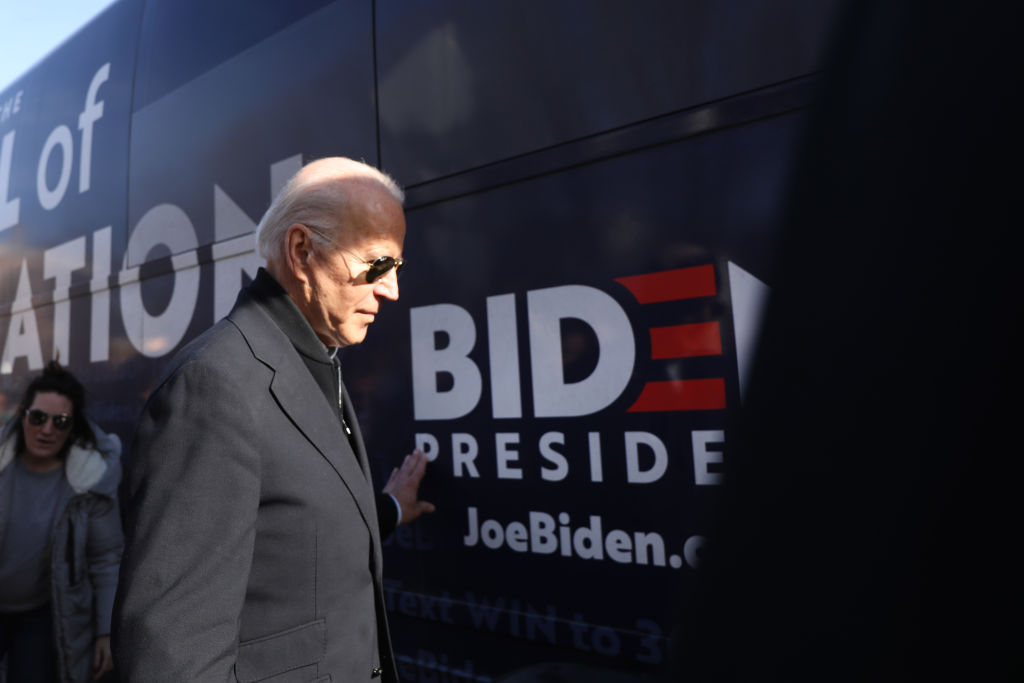 Democratic presidential candidate former Vice President Joe Biden gets on his campaign bus after speaking in Somersworth, New Hampshire, on February 05, 2020. (Spencer Platt/Getty Images)