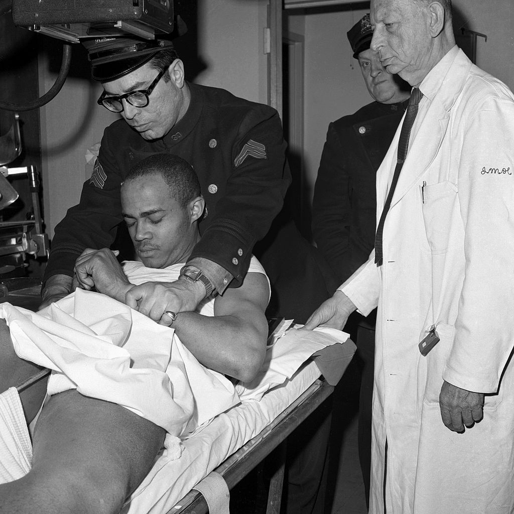 Talmadge Hayer in the hospital after the killing of Malcolm X on Feb. 21, 1965, in New York City. Hayer was wounded in the leg after the shooting.