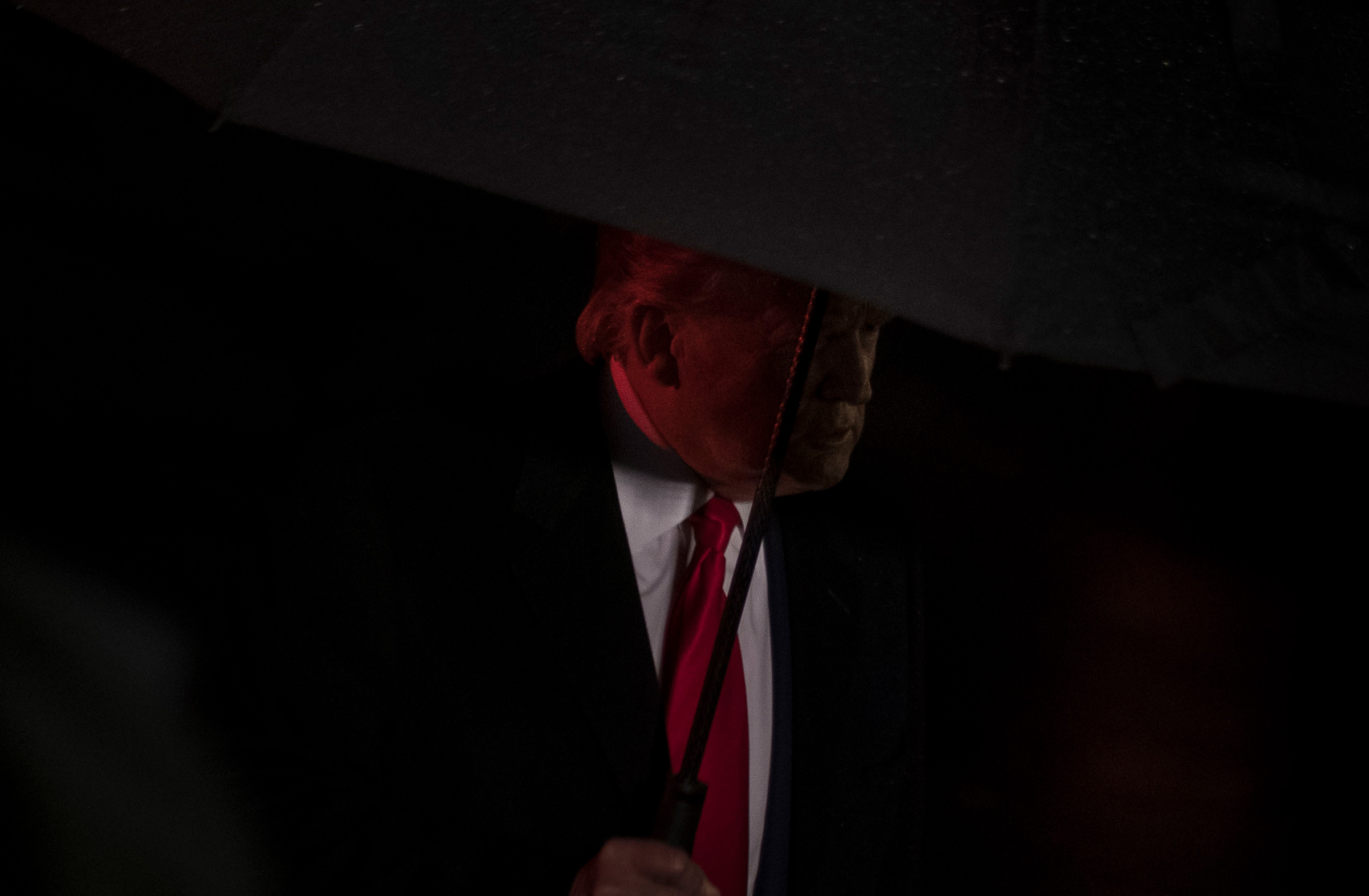 President Donald Trump speaks with reporters before boarding Marine One at the White House in Washington, D.C., Dec. 10, 2019. (Gabriella Demczuk for TIME)