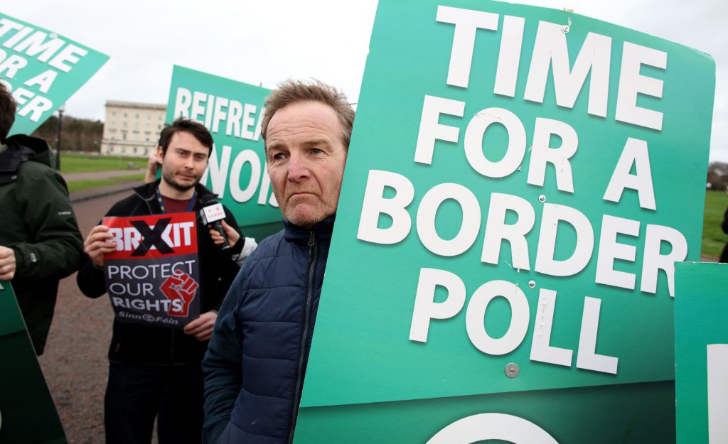 Sinn Fein activists protest at the Parliament Buildings on the Stormont Estate in Belfast on January 31, 2020 against Brexit and call for a border poll on Irish Unity. (Paul Faith—AFP via Getty Images)