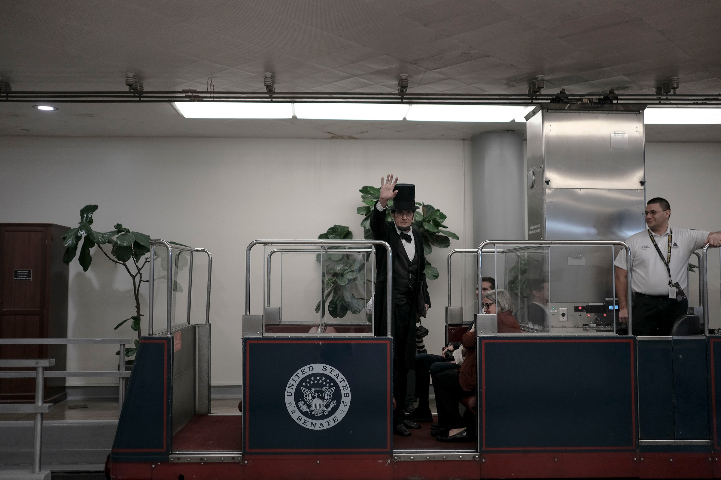 George Buss, a Lincoln impersonator, rides the Senate subway before the impeachment vote at the Capitol in Washington, D.C., on Feb. 5, 2020. (Gabriella Demczuk for TIME)
