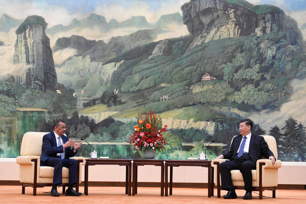 Dr. Tedros Adhanom, Director General of the World Health Organization, (L) meets with Chinese President Xi Jinping at the Great Hall of the People, on Jan. 28, 2020 in Beijing, China. (Naohiko Hatta—Pool/Getty Images)