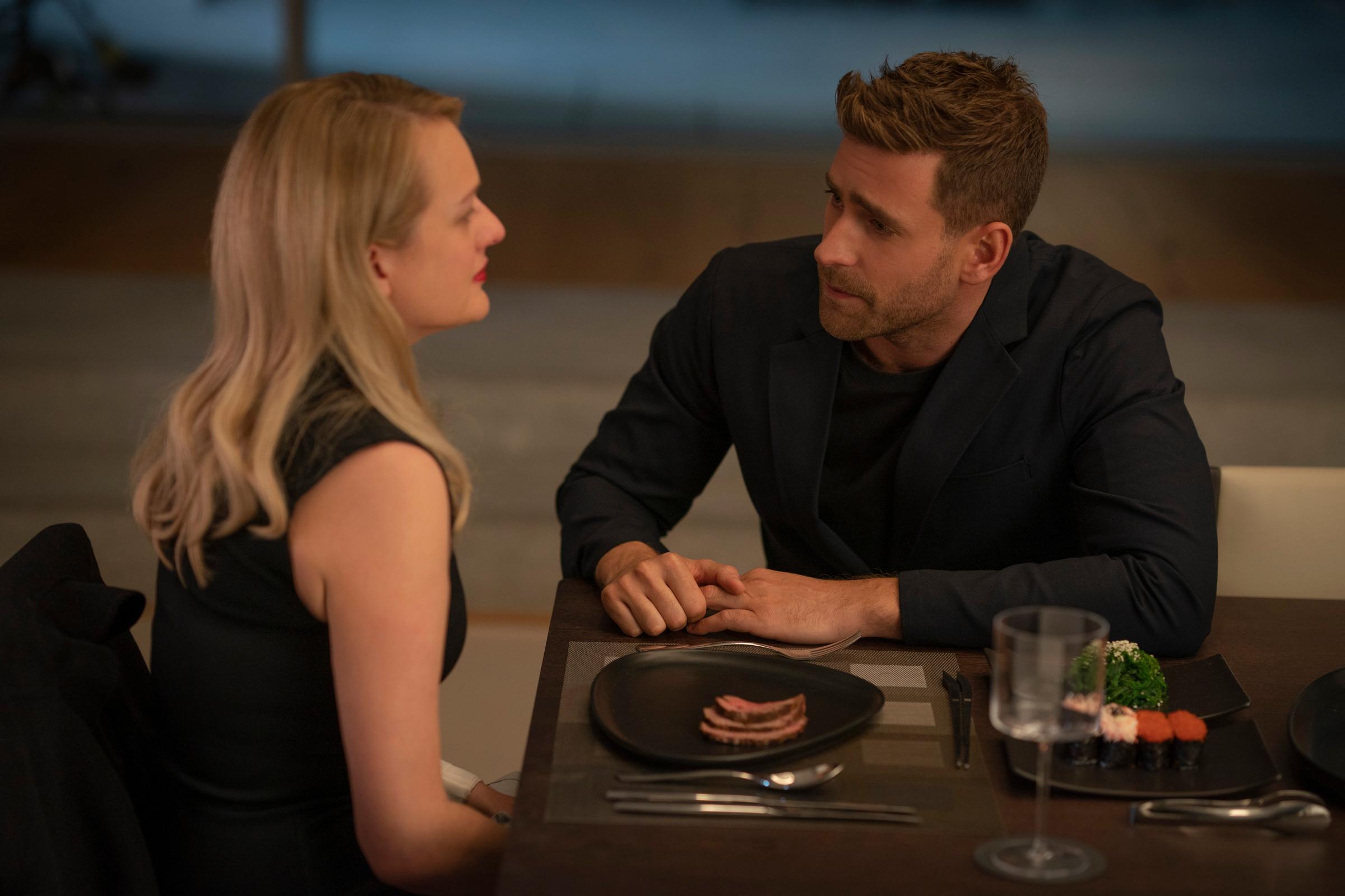 Cecilia Kass (Elisabeth Moss, back to camera) and Adrian Griffin (Oliver Jackson-Cohen) in "The Invisible Man," written and directed by Leigh Whannell.