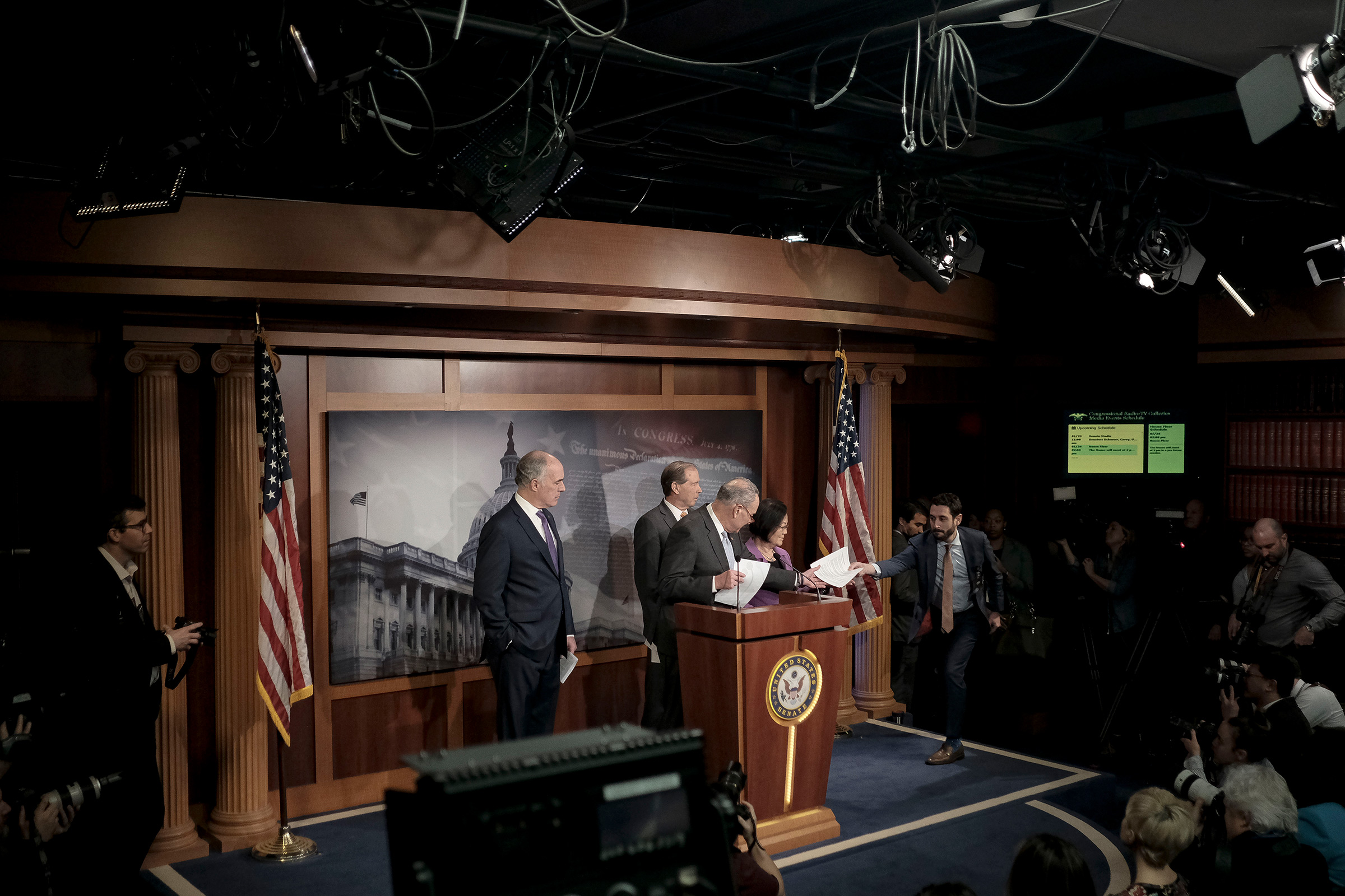Senate Minority Leader Chuck Schumer (D-N.Y.) along with other senate democratic leaders speak to reporters at a press conference before the senate impeachment trial at the Capitol in Washington, D.C. on Jan. 23, 2020. (Gabriella Demczuk for TIME)