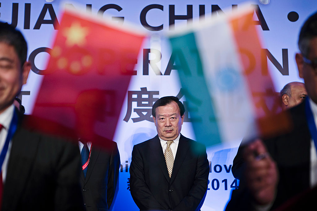 Xia Baolong, Chinese Communist Party secretary of Zhejiang province, stands during a signing ceremony at the India-China Business Cooperation Conference in New Delhi, India, on Wednesday, Nov. 26, 2014. Billionaire Jack Ma, chairman of Alibaba Group Holding Ltd., said he is keen to invest more in India and will work with Indian technology entrepreneurs. (Prashanth Vishwanathan–Bloomberg/Getty Images)
