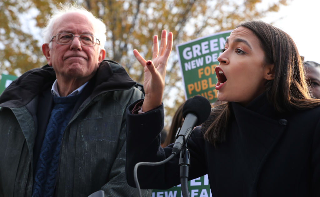 Bernie Sanders and Alexandria Ocasio-Cortez introducing legislation to transform public housing as part of their Green New Deal proposal, on Nov. 14, 2019. (Chip Somodevilla—Getty Images)