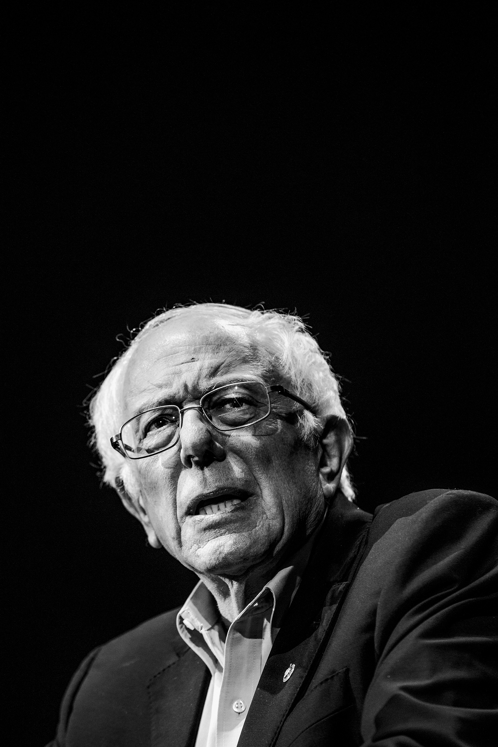 Sen. Bernie Sanders speaks at the Bernie Caucus Concert with band Vampire Weekend
