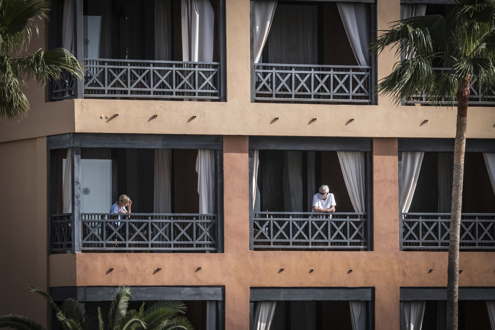 The hotel H10 Costa Adeje Palace, which has been quarantined because of coronavirus cases, continues to be cordoned off by the police on Feb. 27 in Santa Cruz de Tenerife, Spain. (Arturo Rodriguez—picture-alliance/dpa/AP)