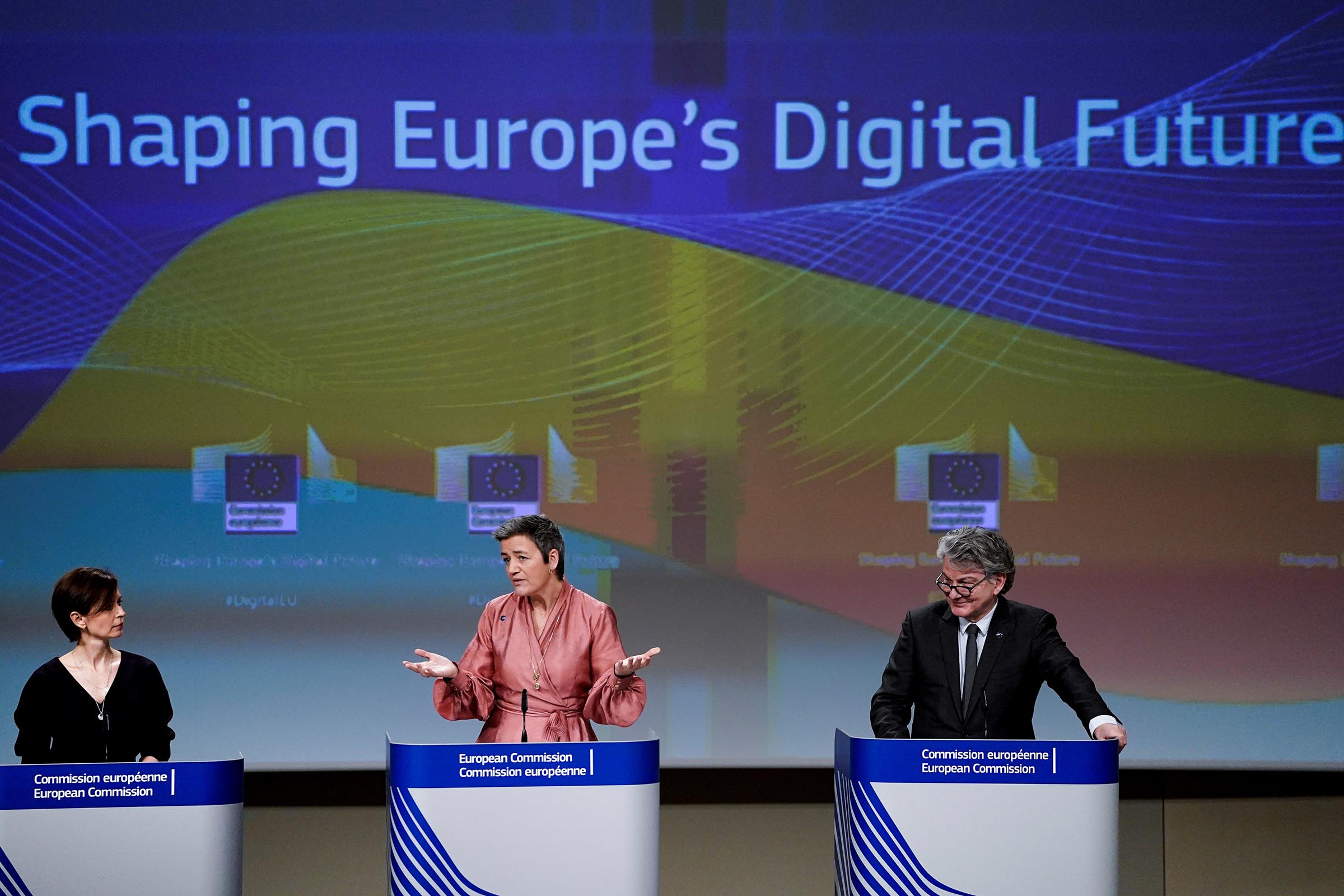 European Commission Executive Vice-President Margrethe Vestager  (C) and EU Commissioner for Internal Market Thierry Breton (R) give a press conference on Artificial Intelligence (AI) on Feb. 19, 2020 at the European Commission headquarters in Brussels. (Kenzo Tribouillard—AFP via Getty Images)
