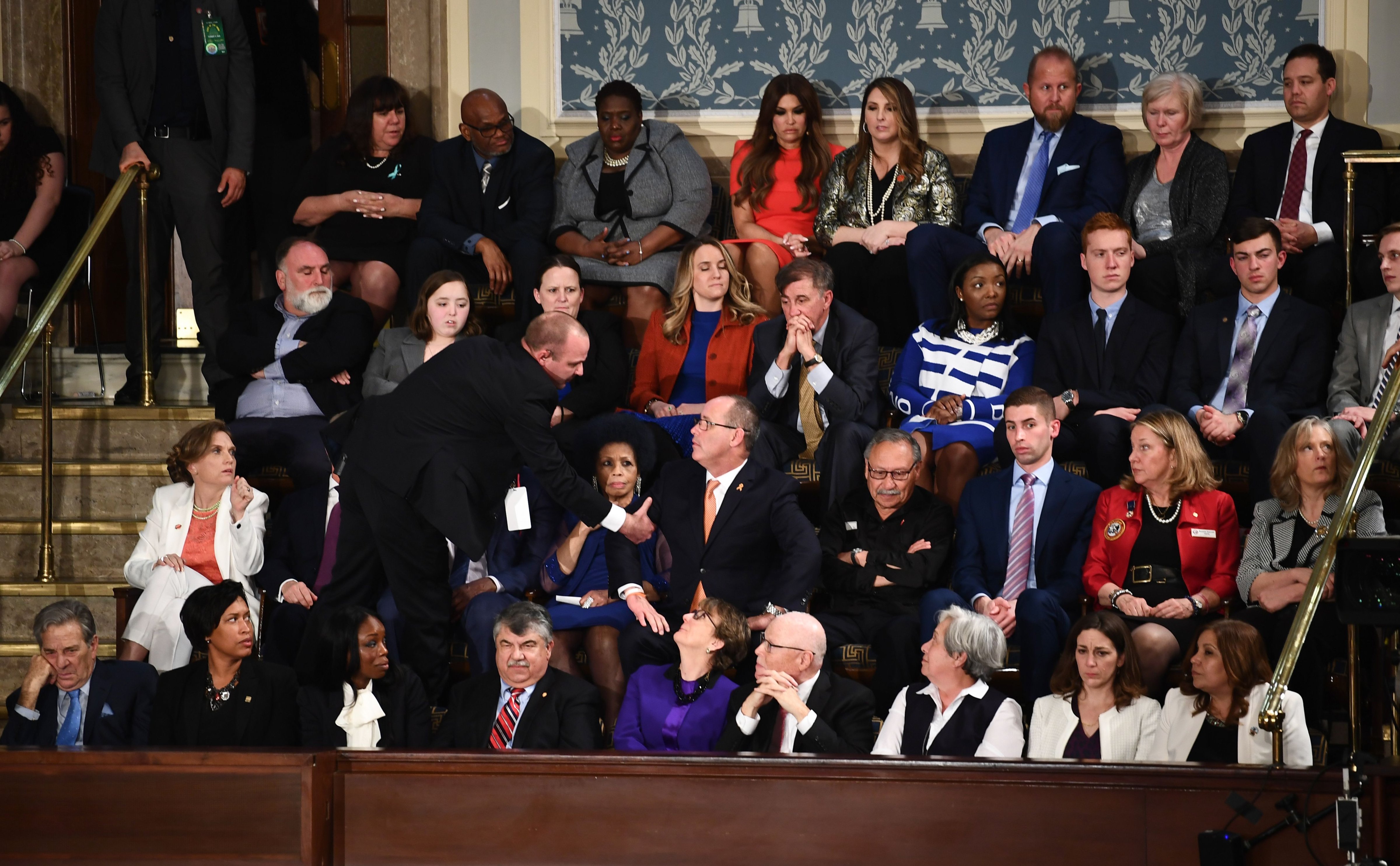 Fred Guttenberg is removed by security after yelling as President Trump delivered the State of the Union address at the US Capitol in Washington, D.C on Feb. 4, 2020. (Brendan Smialowski—AFP/Getty Images))