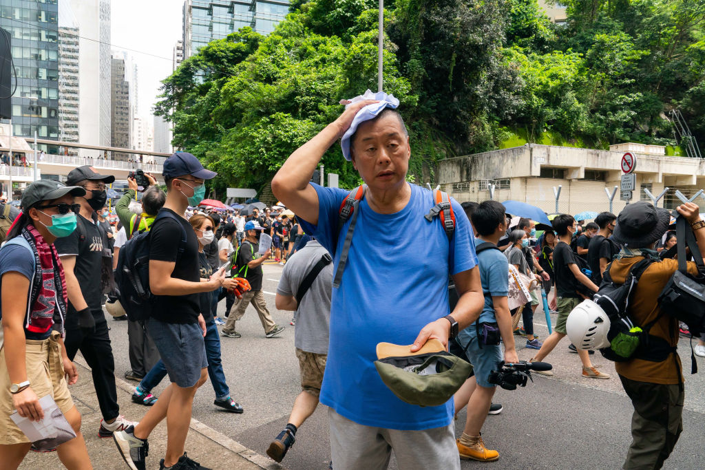 The media tycoon Jimmy Lai attends a pro-democracy protesters march on Aug. 31, 2019 in Hong Kong. Lai was arrested Feb. 28, 2020 in Hong Kong on charges that reportedly included "unlawful assembly" for his attendance at the Aug. 31 march. (Billy H.C. Kwok–Getty Images)