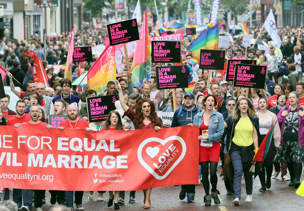 Gay rights campaigners take part in a march through Belfast on July 1, 2017 to protest against the ban on same-sex marriage. (Paul Faith—AFP via Getty Images)