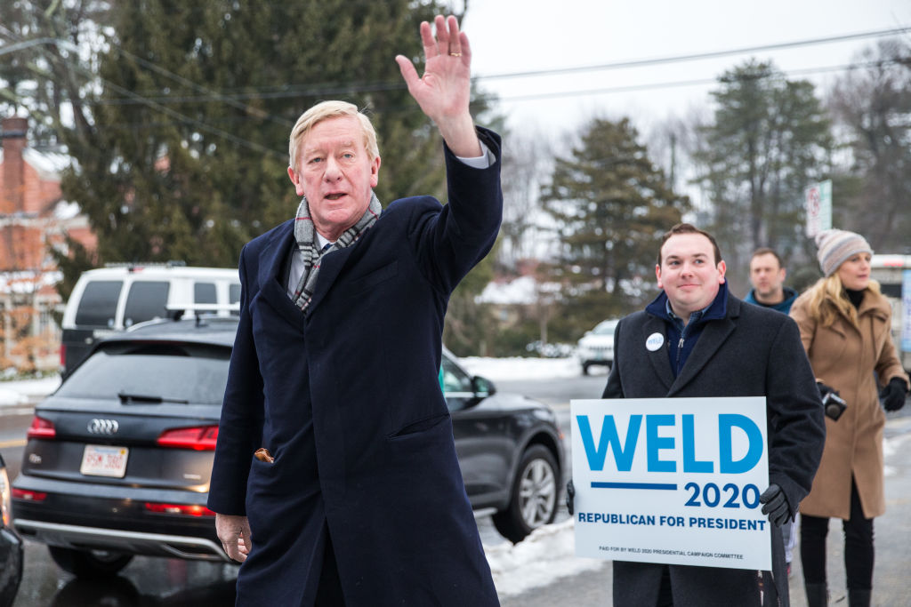 Republican presidential candidate and former Massachusetts Governor Bill Weld waves to voters at the Webster Elementary School during the presidential primary on Feb. 11, 2020 in Manchester, New Hampshire. (Scott Eisen—Getty Images)