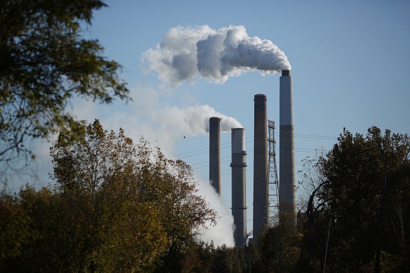Emissions rise from smokestacks at the Kentucky Utilities Co. E.W. Brown generating station in Harrodsburg, Kentucky, U.S., on Tuesday, Oct. 20, 2015.