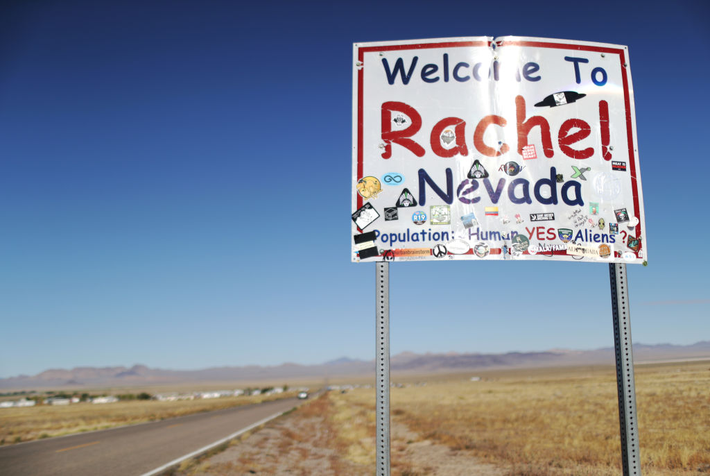 A town sign is posted, mentioning aliens, during the 'Storm Area 51' spinoff event 'Alienstock' on September 21, 2019 in Rachel, Nevada. (Mario Tama—Getty Images)