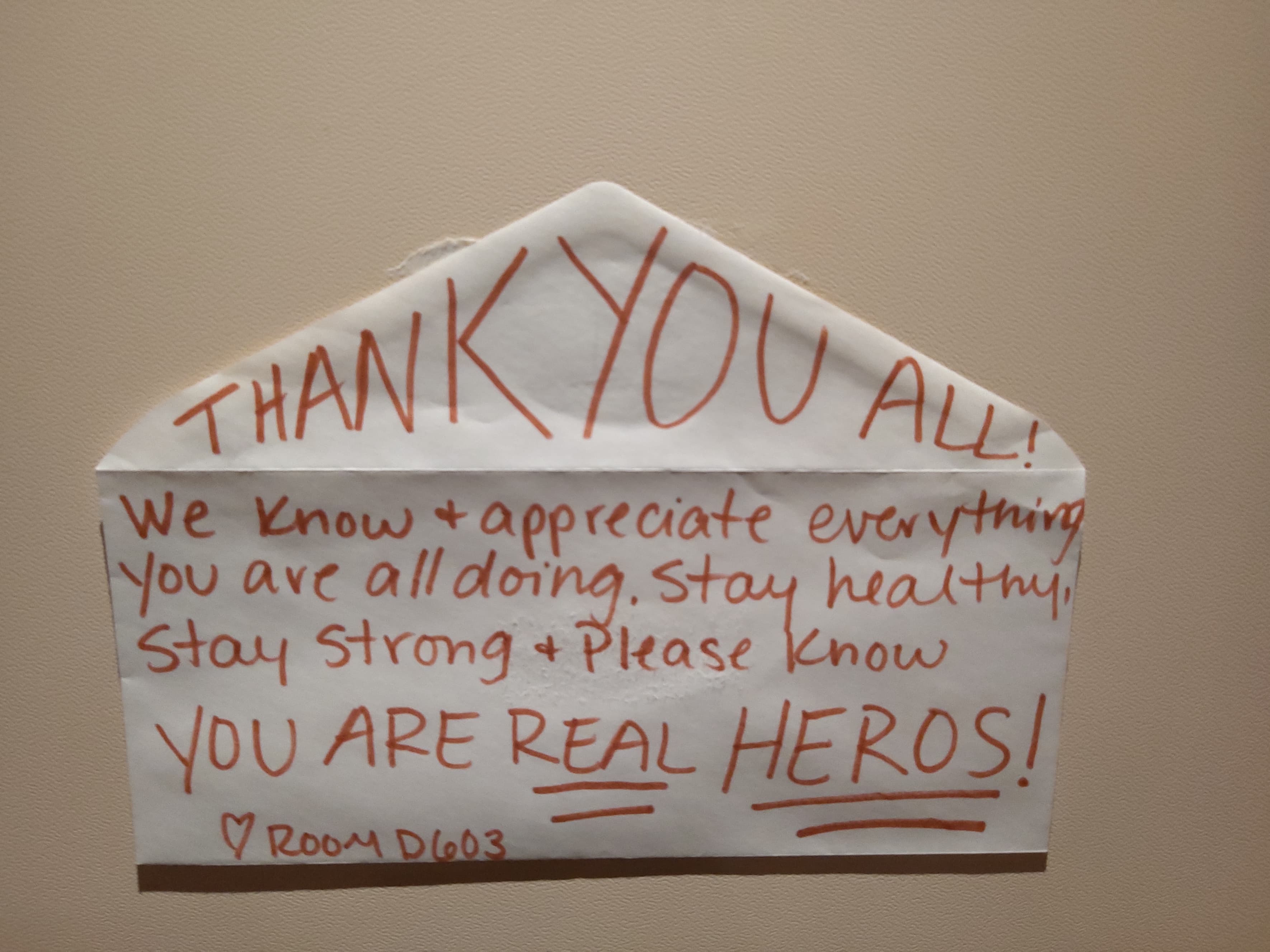 A thank you note to crew is stuck to the door of a cabin aboard the quarantined <em>Diamond Princess</em> cruise ship (Sent to TIME via Gie, a <em>Diamond Princess</em> crew member)