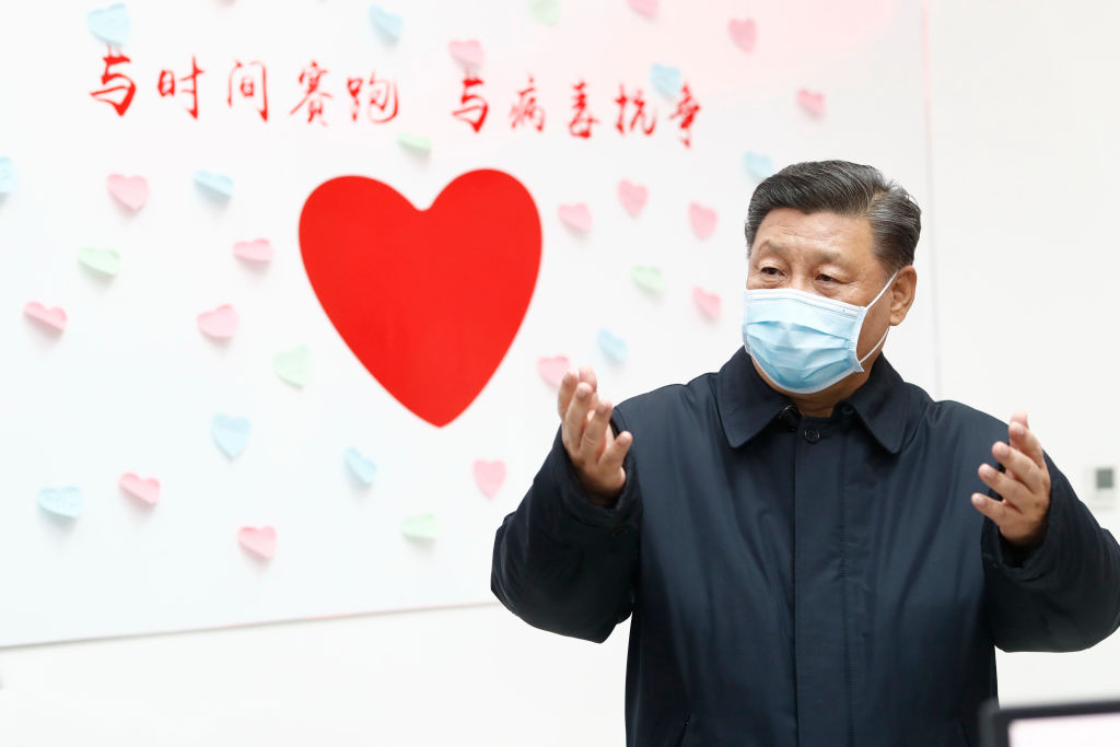 Chinese President Xi Jinping, also general secretary of the Communist Party of China Central Committee and chairman of the Central Military Commission, inspects the center for disease control and prevention of Chaoyang District in Beijing, capital of China, on Feb. 10, 2020. Xi on Monday inspected the novel coronavirus pneumonia prevention and control work in Beijing. (Liu Bin–Xinhua/Getty Images)