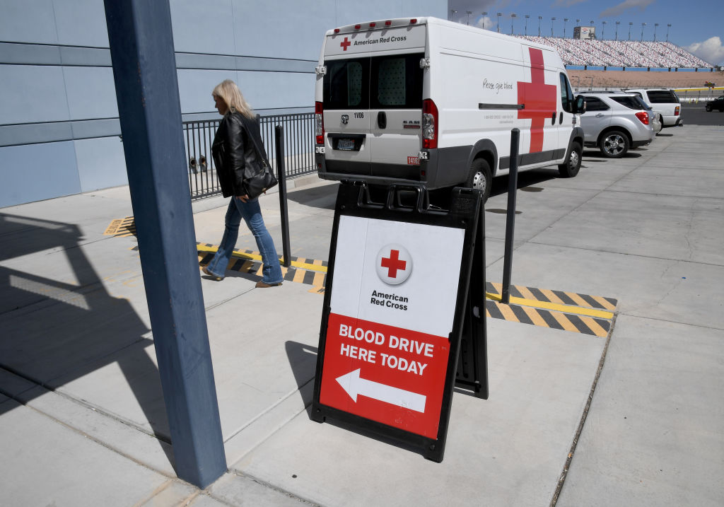 A woman arrives at an American Red Cross blood drive held to help alleviate a blood supply shortage as a result of the coronavirus pandemic at Las Vegas Motor Speedway on March 27 in Las Vegas, Nevada. (Ethan Miller / Getty Images)