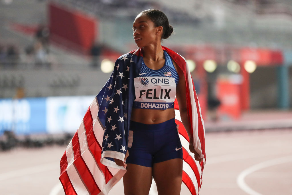 Allyson Felix of the United States poses after setting a new world record in the 4x400 Metres Mixed Relay during day three of 17th IAAF World Athletics Championships Doha 2019 at Khalifa International Stadium on September 29, 2019 in Doha, Qatar. (Maja Hitij—Getty Images)