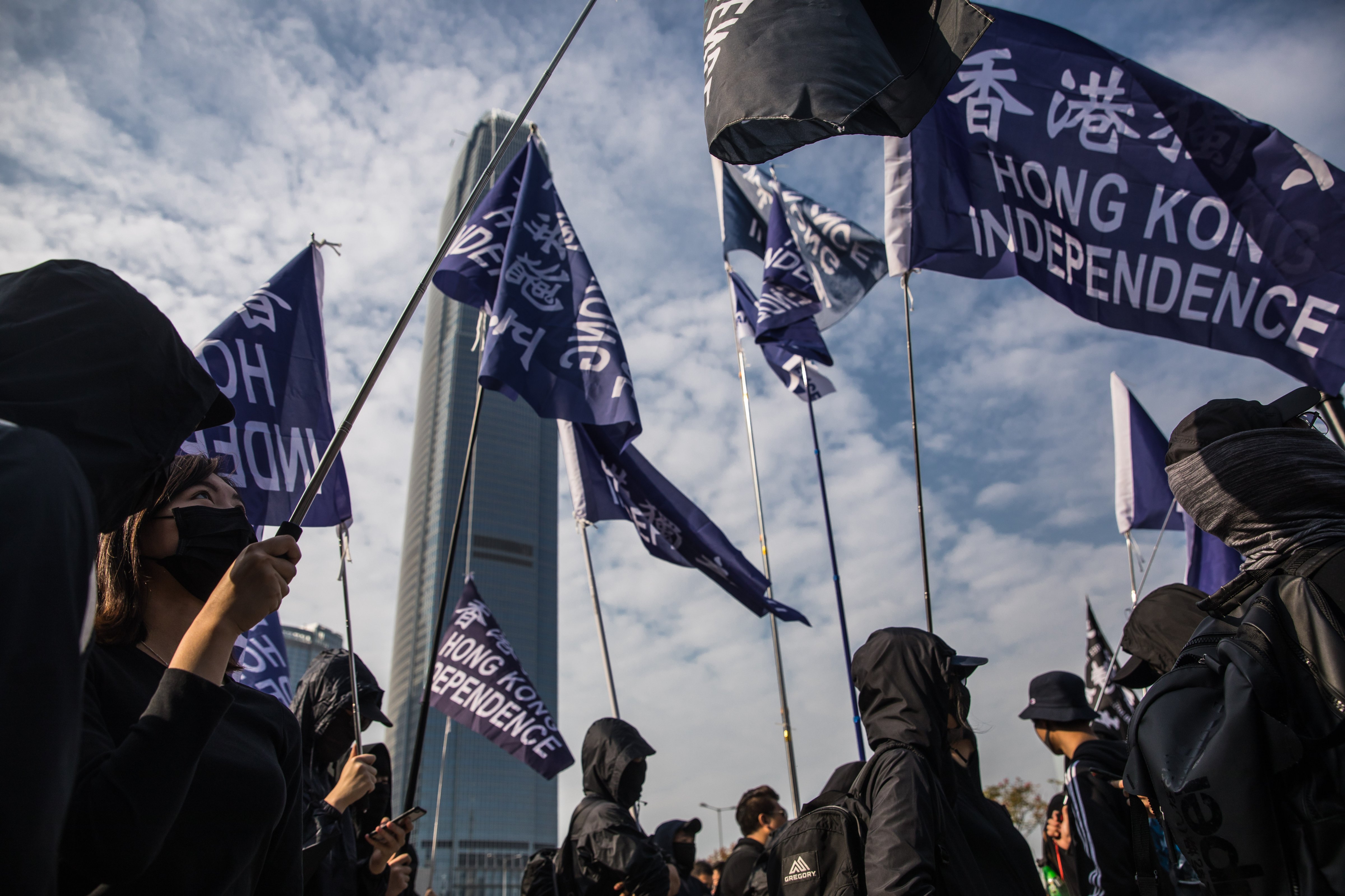 A group of Hong Kong independence supporters display flags during a pro-democracy rally at Edinburgh Place in the Central district of Hong Kong on January 12, 2020. (DALE DE LA REY/AFP via Getty Images)