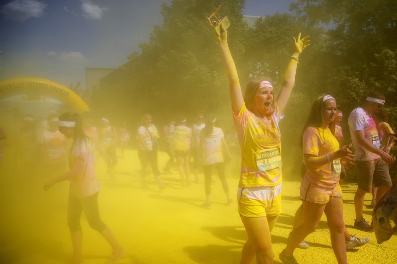 London, June 7, 2015: Runners take part in the Color Run around Wembley Stadium in London—Photo by Tolga Akmen/Anadolu Agency/Getty Images