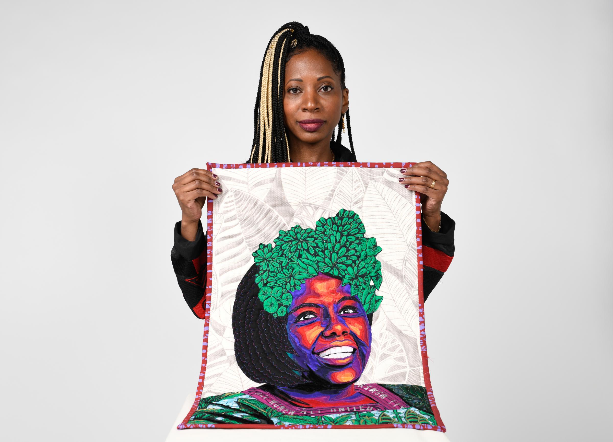 Artist Bisa Butler with her artwork on Feb. 24, 2020 at TIME studios.