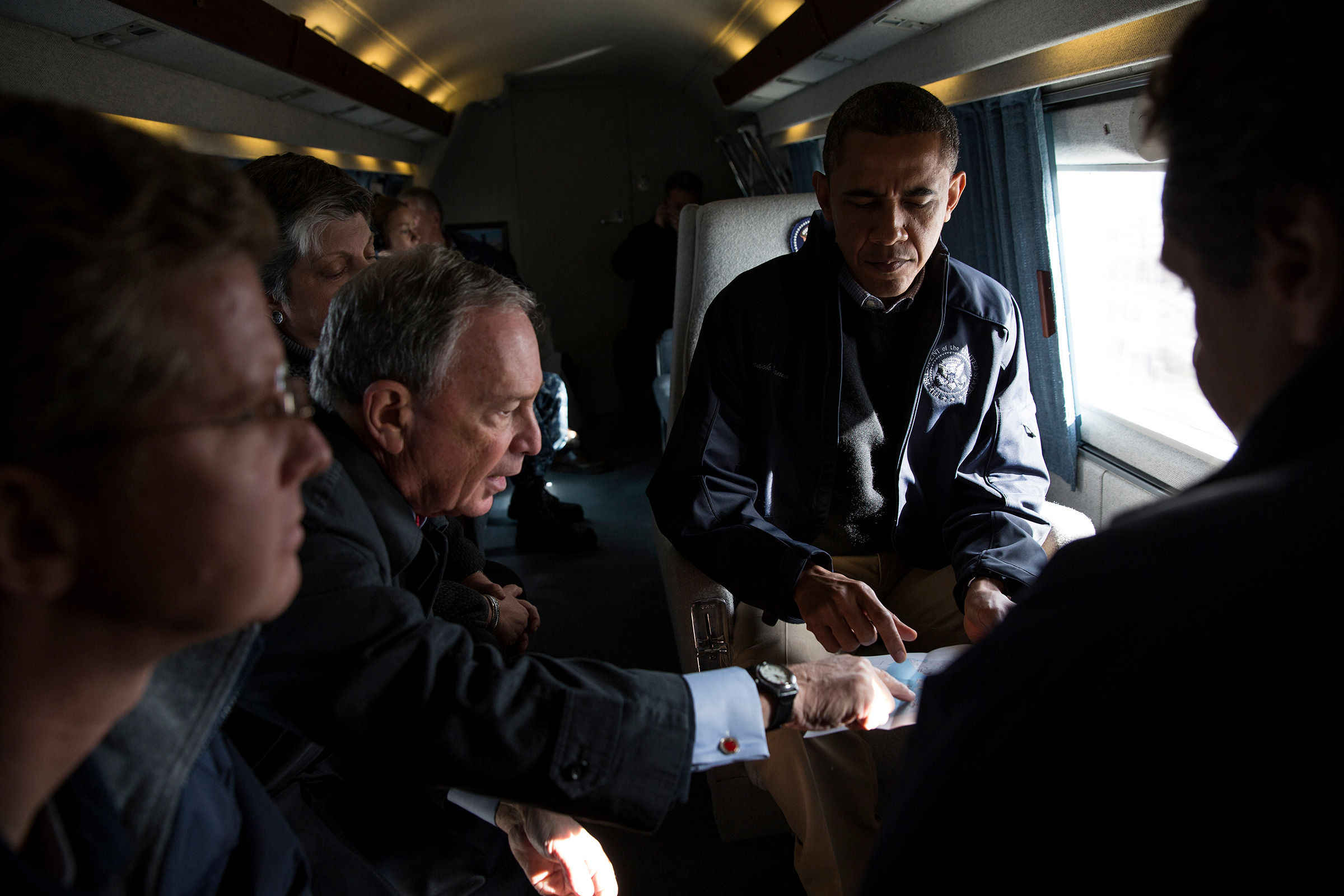 Bloomberg, the New York City mayor, views a map with President Obama during an aerial tour to view damage there from Superstorm Sandy on Nov. 15, 2012. (Pete Souza—The White House/Getty Images)