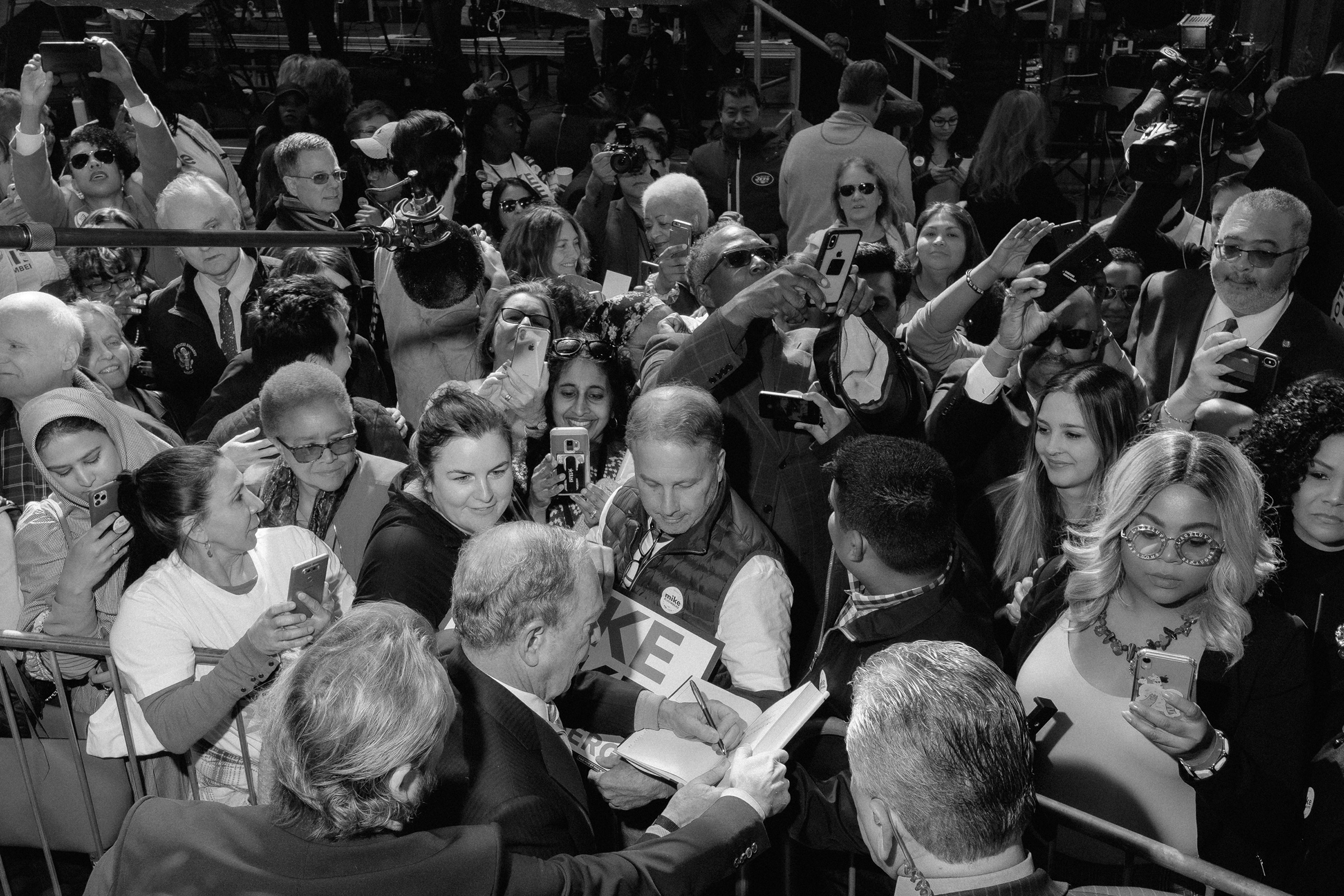 Bloomberg signs autographs and greets supporters at a rally in downtown Houston on Feb. 27. (Christopher Lee for TIME)