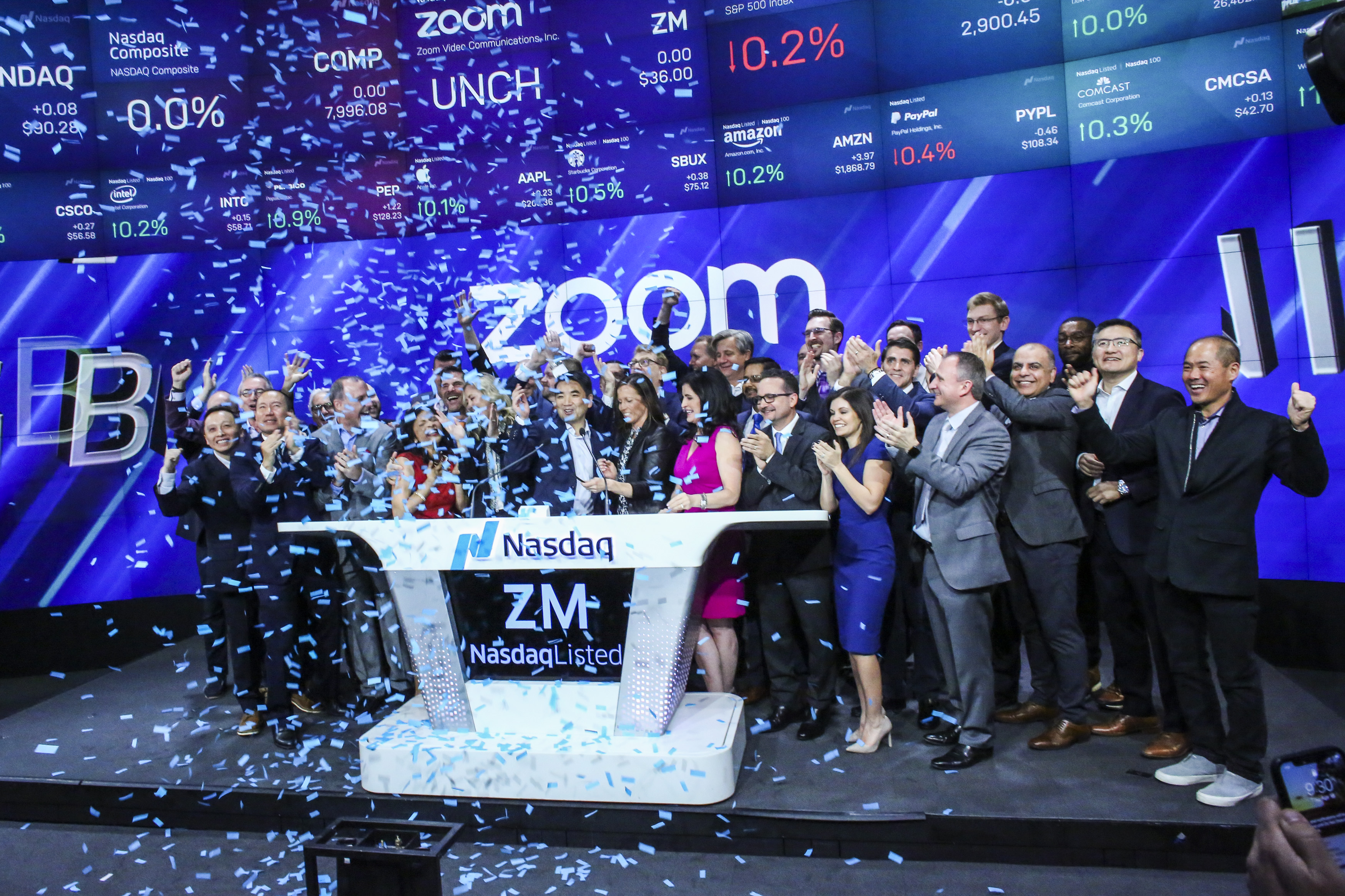 Confetti falls as Zoom founder Eric Yuan rings the Nasdaq opening bell on April 18, 2019 in New York City. The video-conferencing software company has seen its share price soar as companies have employees work remotely out of concerns about the coronavirus. (Kena Betancur—Getty Images)