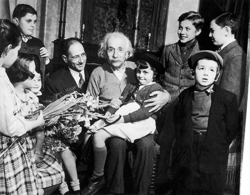 Albert Einstein celebrating his 70th birthday with children from a displaced persons camp on Mar. 13, 1949, at his home in Princeton, N.J.