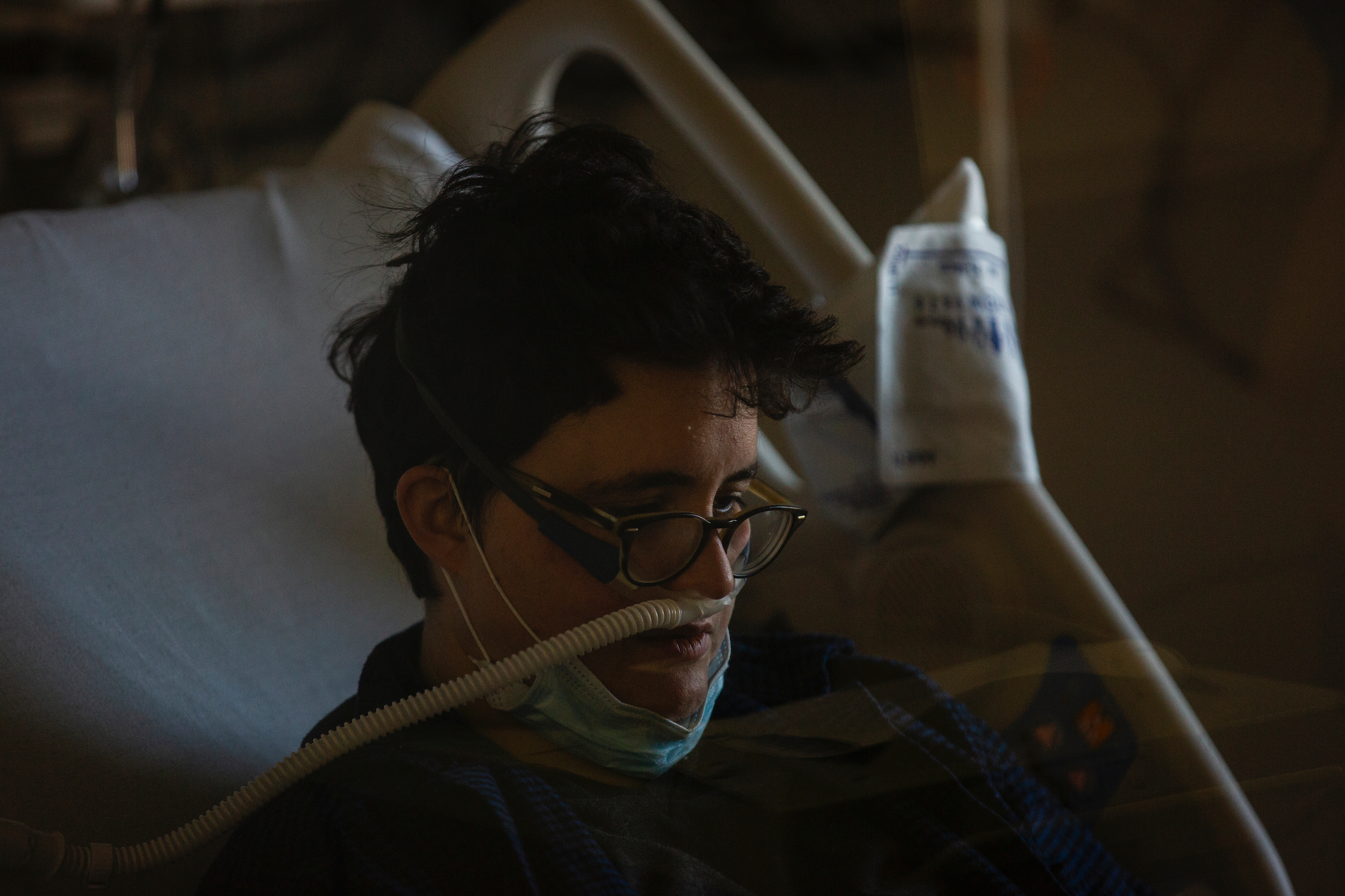 "The hardest part is not being able to breathe. But also, the unknown." Dr. Laura Mulvey, photographed resting in her isolation unit at Maimonides Medical Center in Brooklyn on March 26, was discharged the next day. (Benjamin Norman for TIME)