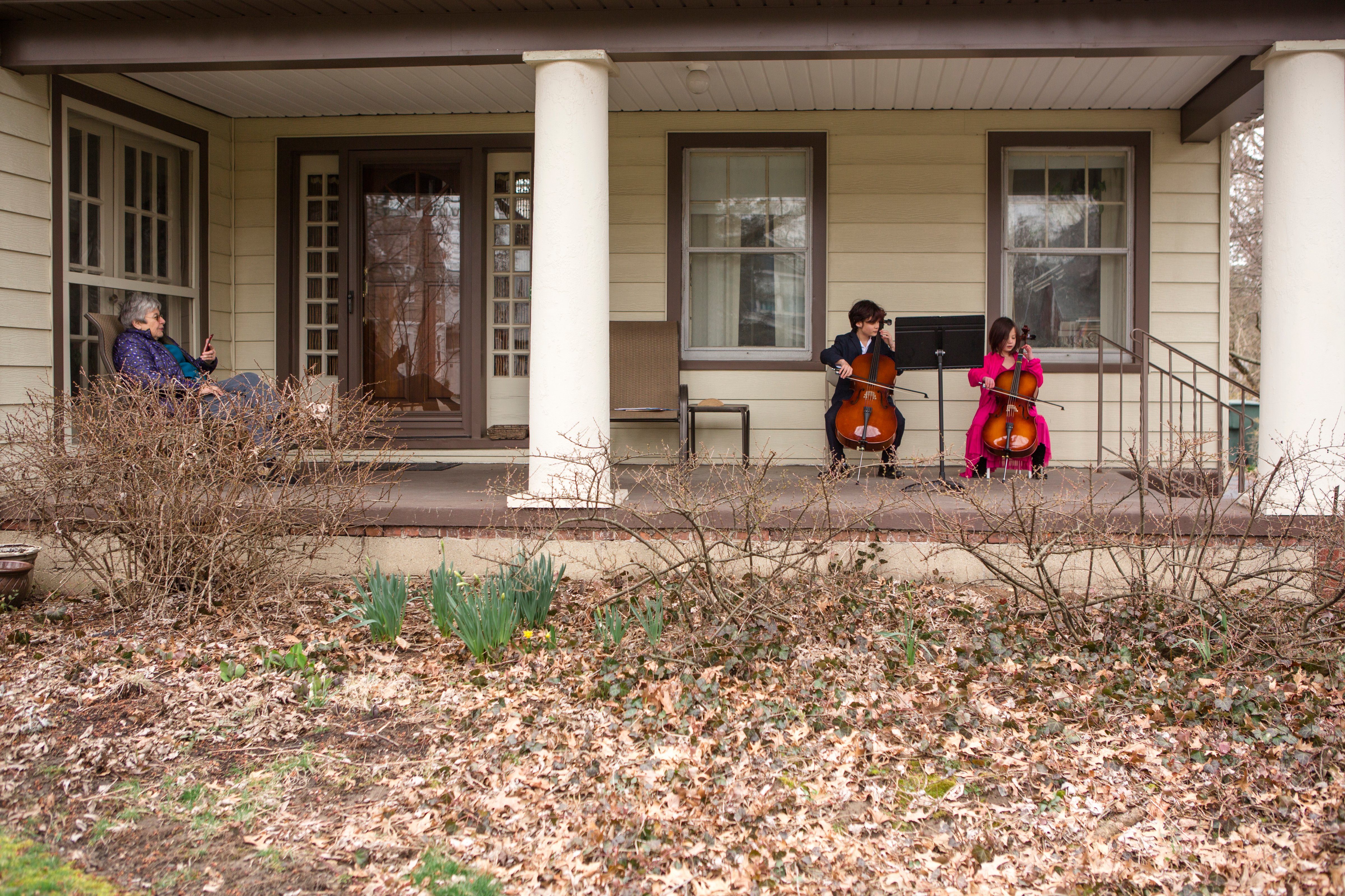 Two Kids Played Cello for Their Self-Isolated Neighbor