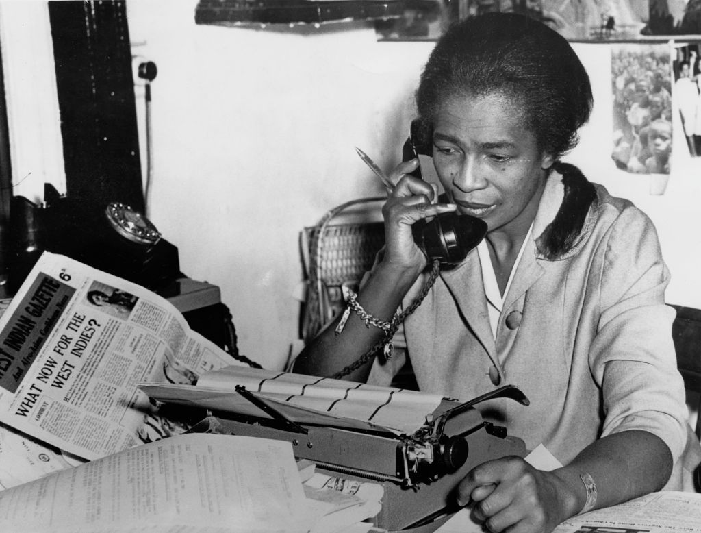 Trinidad-born journalist and activist Claudia Jones at the Brixton, London, offices of the newspaper she founded, <i>The West Indian Gazette </i> in 1962. (FPG/Archive Photos—Getty Images)