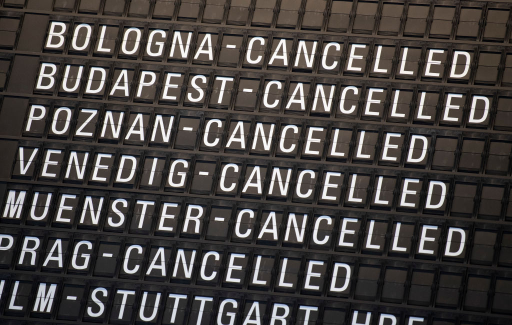 Canceled flights can be seen on a terminal display board, on March 13 in Frankfurt, Germany. (Boris Roessler/picture alliance—Getty Images)