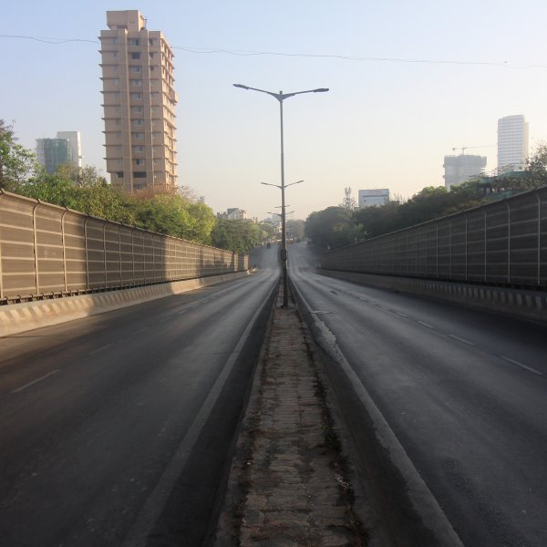 An empty road is seen during a nationwide curfew in response to the outbreak of the coronavirus (COVID-19) pandemic in Mumbai, India on March 22, 2020.