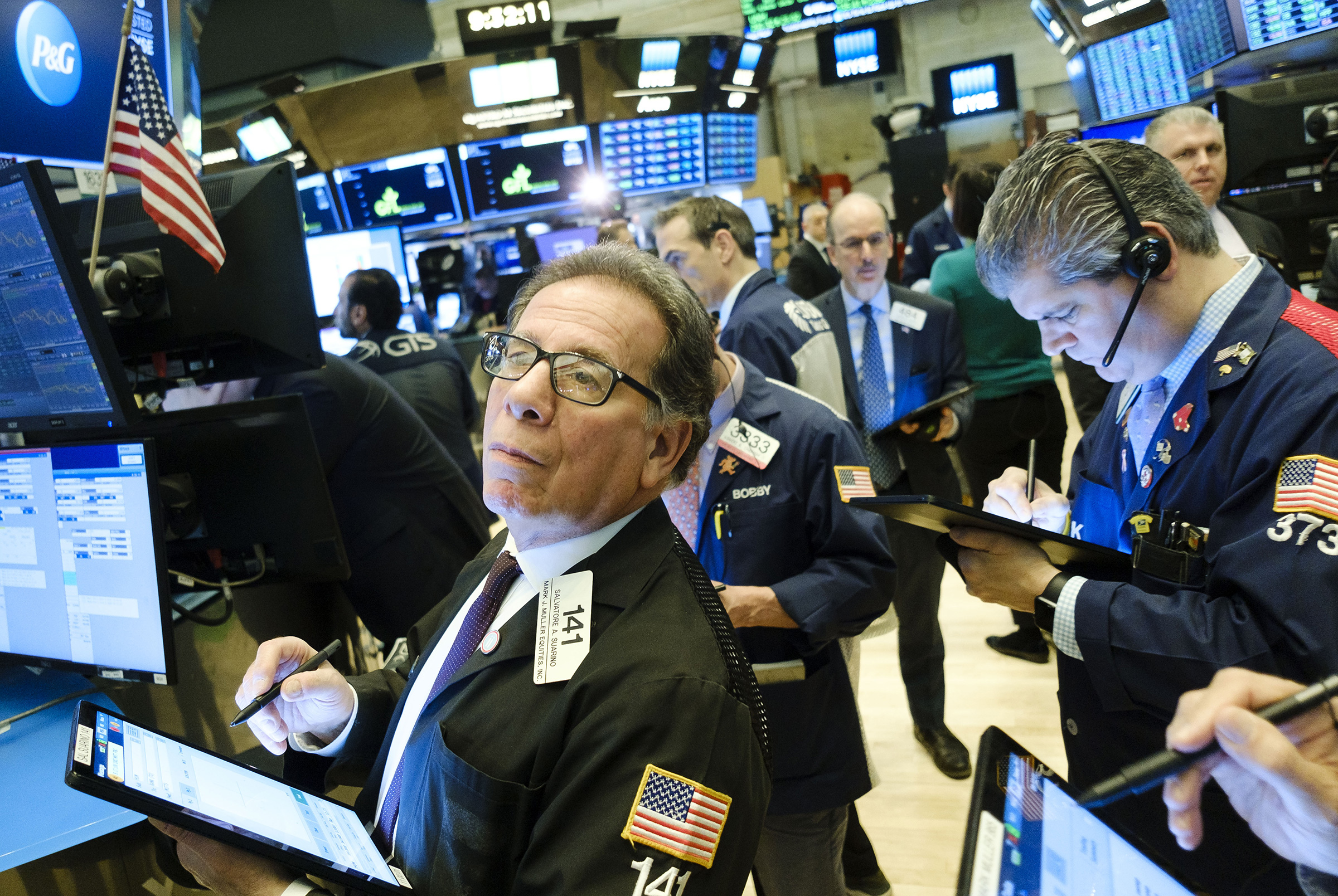 Traders work on the floor of the New York Stock Exchange on Mar. 4 (Justin Lane—EPA-EFE/Shutterstock)