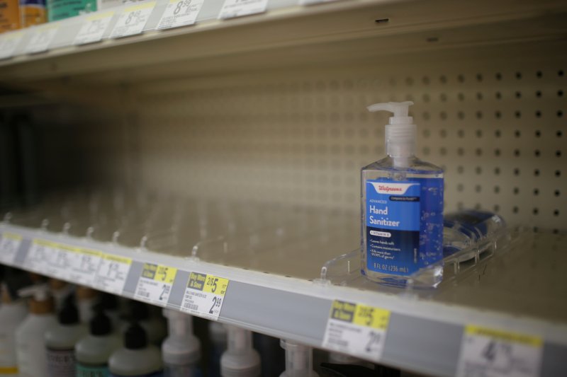 In this Feb. 28, 2020 photo, rows of hand sanitizer are seen empty at a Walgreens in Idaho Falls, Idaho.