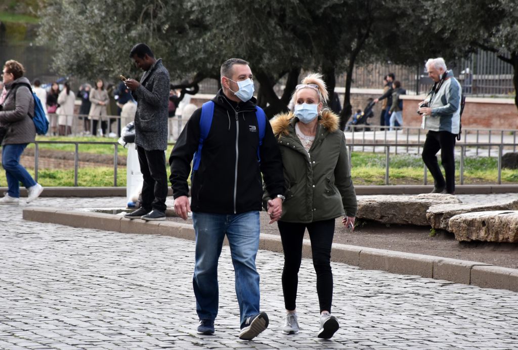 People wear face masks as a precaution against coronavirus in Rome, Italy on March 6, 2020. (Anadolu Agency via Getty Images—2020 Anadolu Agency)