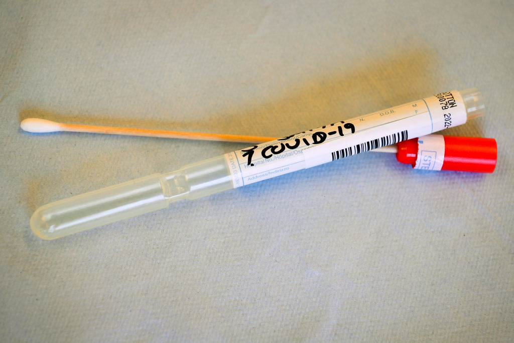 A dummy COVID-19 swab outside its sealed sterile tube during a demonstration. (Photo by Ben Birchall/PA Images via Getty Images))